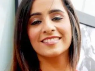 Tina Kuwajerwala Thumbnail