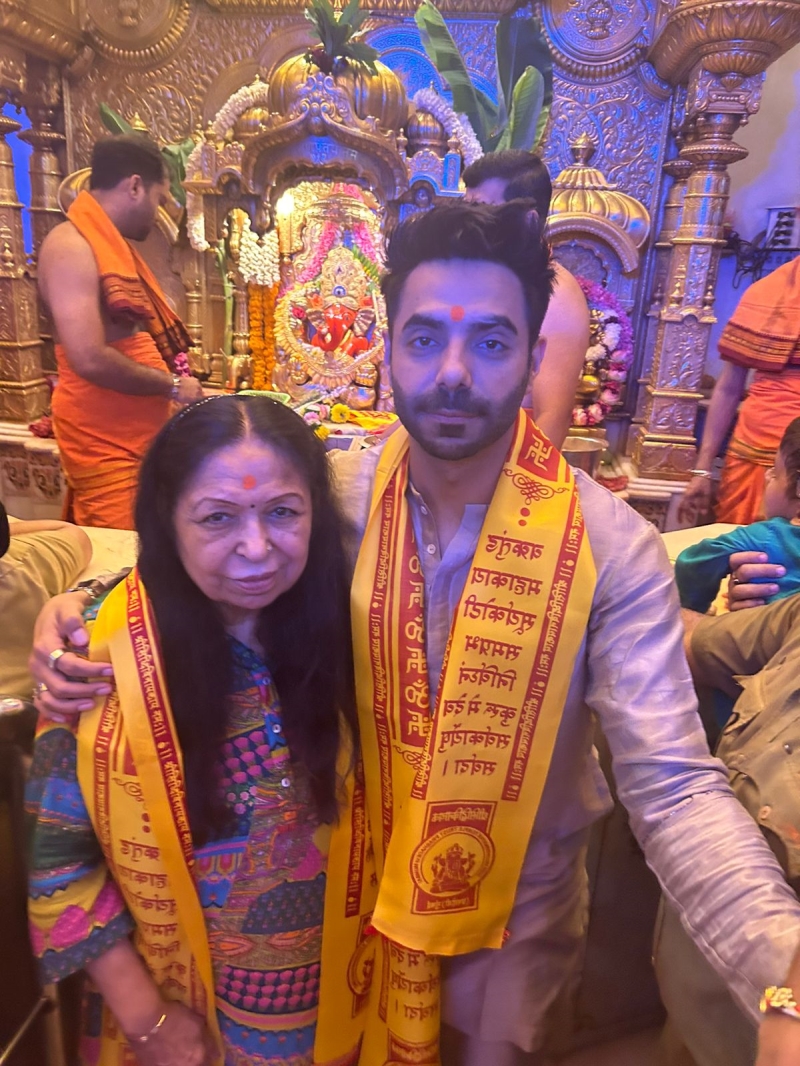 Aparshakti Khurana with Mother at Siddhivinayak Temple Photo | Indiaforums