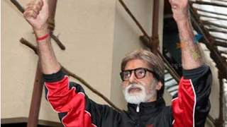 Big B greets his fans at his bungalow thumbnail