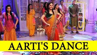 Which song is Aarti performing on?