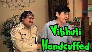 Why is Vibhuti ji handcuffed?